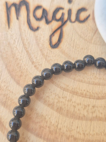 Pulsera Obsidiana Negra 4mm - Amuleto de Protección Energética JoyeriamineralespulserasTienda esotérica Málaga - La Tienda de Tata Magic: tienda Esotérica en Málaga