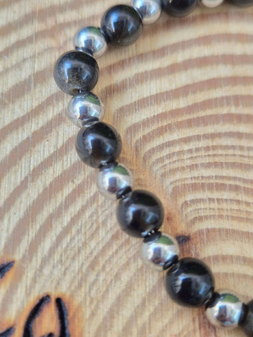 Pulsera obsidiana y acero 6 mm JoyeriamineralespulserasTienda esotérica Málaga - La Tienda de Tata Magic: tienda Esotérica en Málaga
