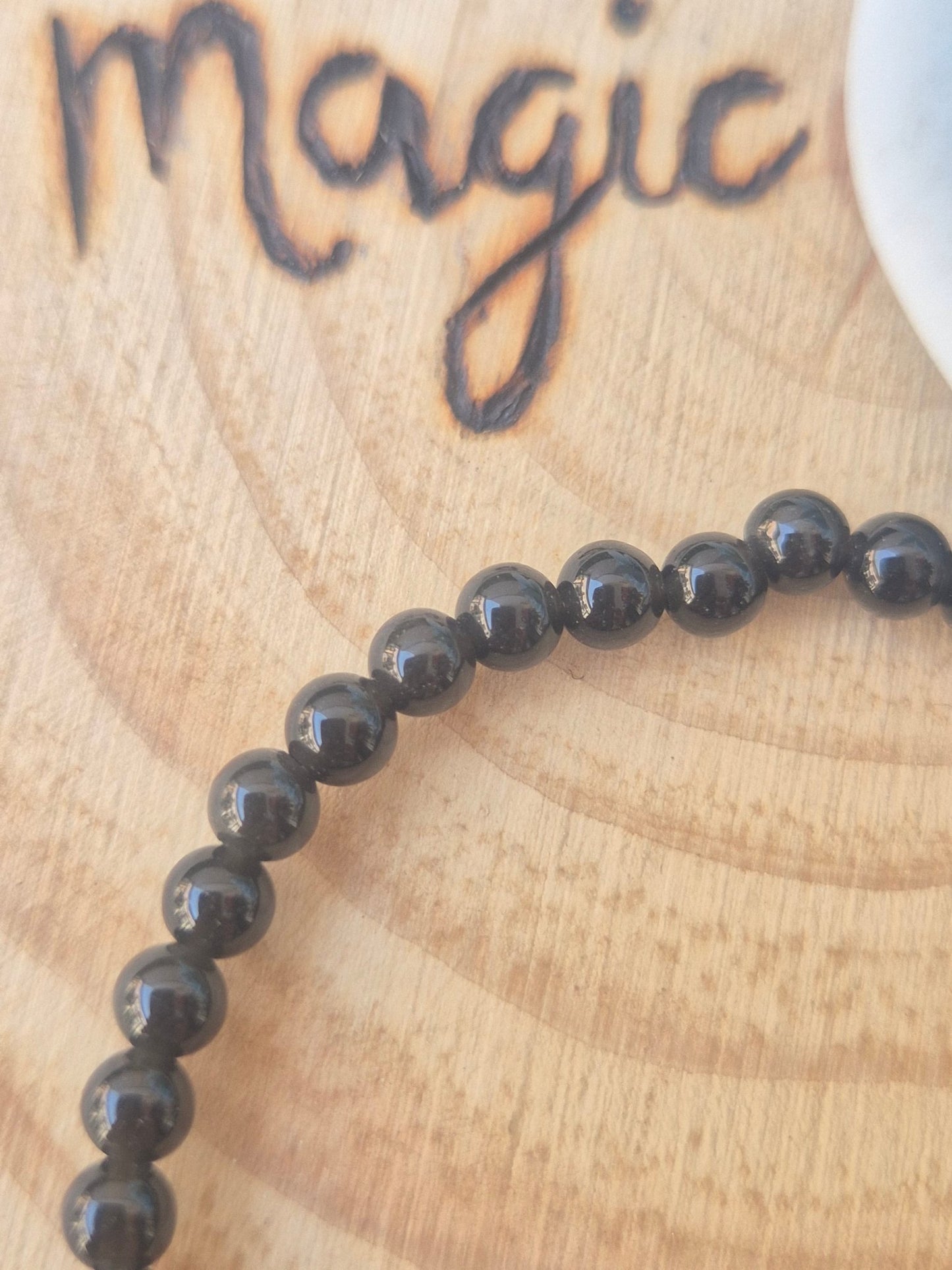 Pulsera Obsidiana Negra 4mm - Amuleto de Protección Energética JoyeriamineralespulserasTienda esotérica Málaga - La Tienda de Tata Magic: tienda Esotérica en Málaga