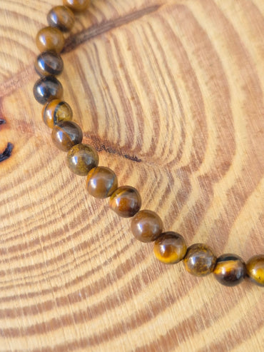Pulsera Ojo de Tigre 4mm - Protección, Energía y Confianza JoyeriamineralespulserasTienda esotérica Málaga - La Tienda de Tata Magic: tienda Esotérica en Málaga
