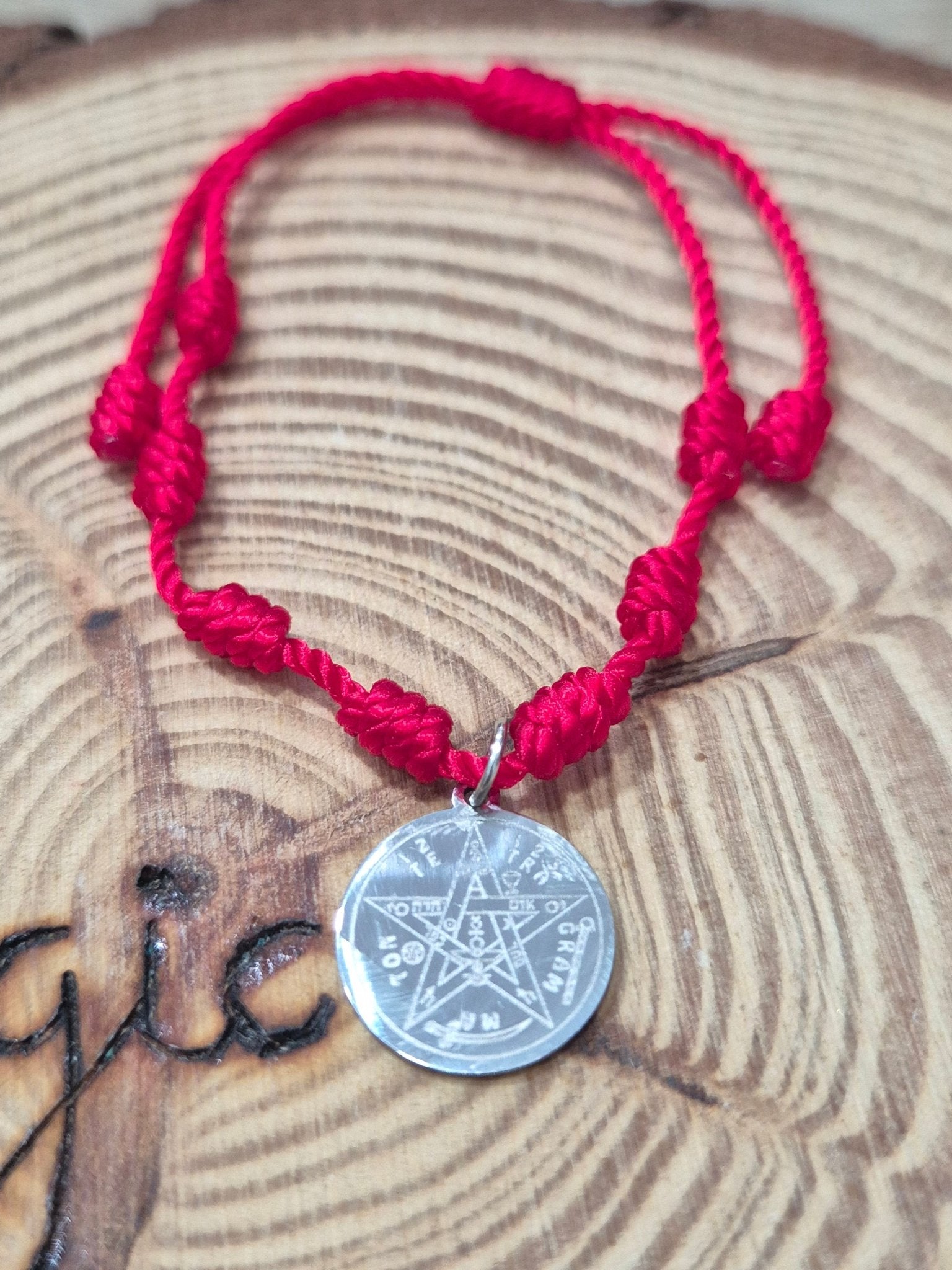 Pulsera 7 nudos roja con tetragramaton en acero Tienda esotérica Málaga - La Tienda de Tata Magic: tienda Esotérica en Málaga